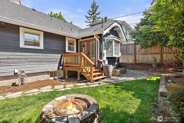 Enjoy gathering around the outdoor firepit Enjoy gathering around the outdoor firepit