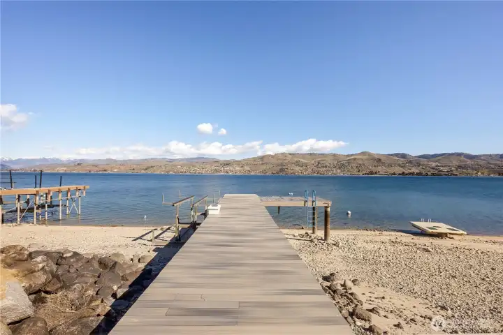 Private dock with boat lift. PUD lowers the lake level appx 11' every year.