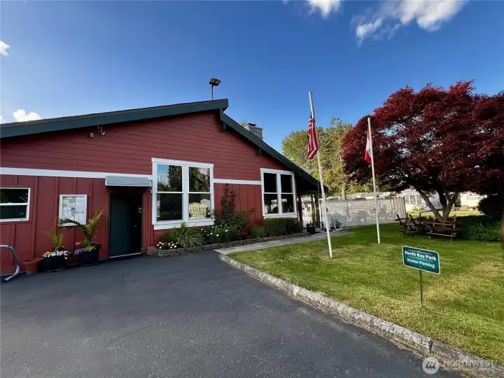 front of clubhouse with parking spaces