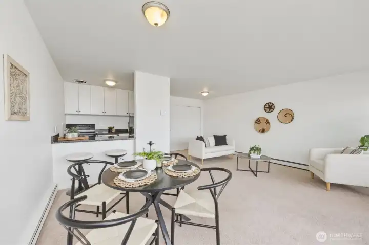 Kitchen seamlessly flows into large living/dining area Kitchen seamlessly flows into large living/dining area