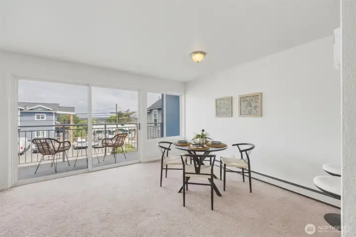 Large wall of windows makes this space very light and bright Large wall of windows makes this space very light and bright