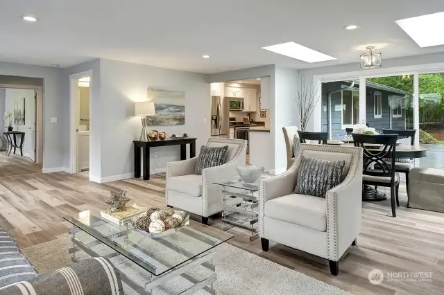 Living room, looking at the entrance to the kitchen.