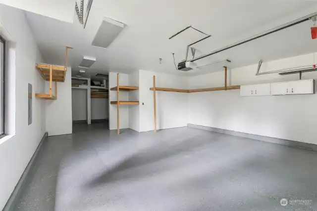 Freshly painted garage with shelving.