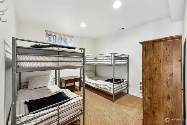 Lower level is the perfect place to put the rambunctious crowd! Room for 4 beds!