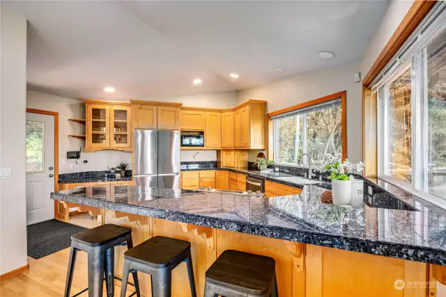 Granite tile counters, newer appliances.