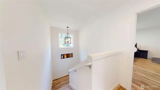 Stairs looking down towards the first level of the home