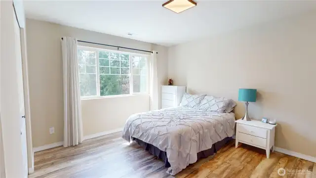 The third of four bedrooms, looking onto the front yard