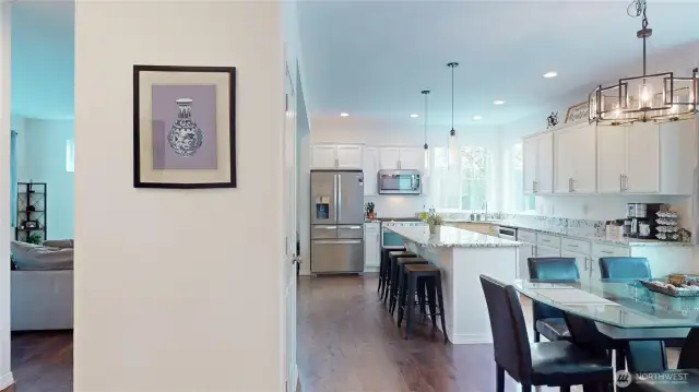From entry looking to dining room & kitchen