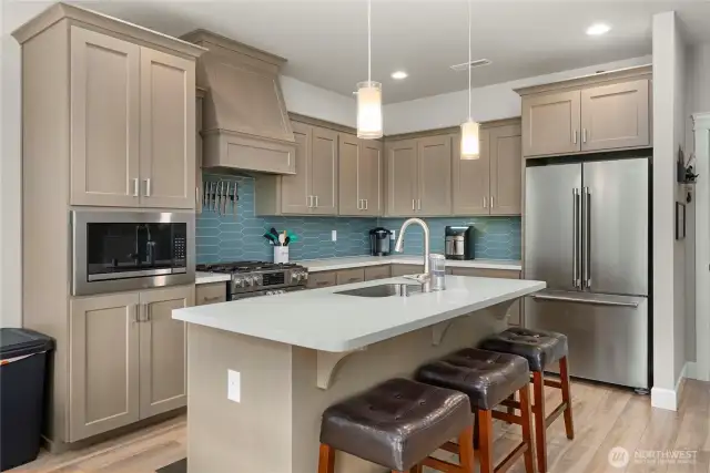 Enjoy this gorgeous kitchen and cooking on your high end appliances.