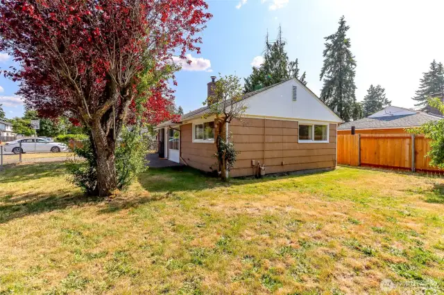 Partially fenced yard and open backyard/side yard is great for yard games during these sunny days!