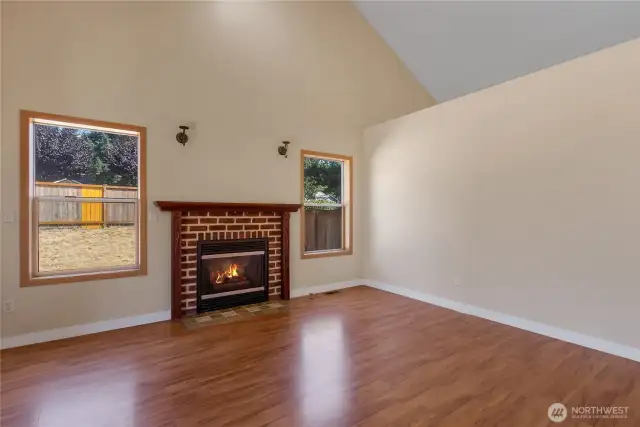 Family room with great natural light and laminate flooring