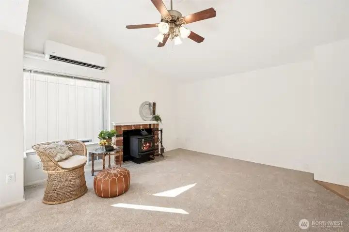 Another view of the great room. The fireplace has a wood stove!