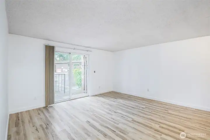 Sliding door to a covered deck.