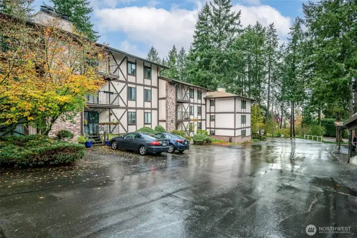 Top of the side parking lot near the second entrance to the building.