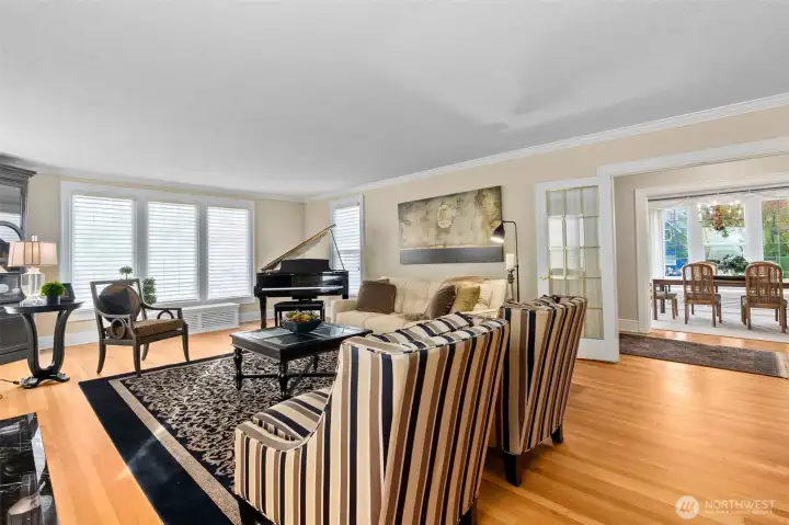 Original oak hardwood floors stretch across the entire main level of the home.