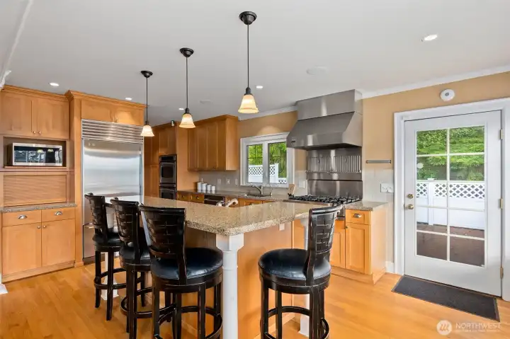 Classic, clean, and highly functional - this chef's kitchen has it all.