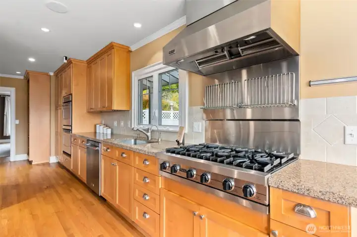 The Viking range is only one of the high-end features of the kitchen. Access to the spacious patio is to the right of this photo.