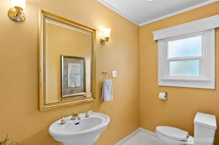 Large 1/2 bathroom on the main level tucked away from the main living areas.