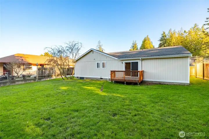 Back yard has lots of space for gardening or yard games.