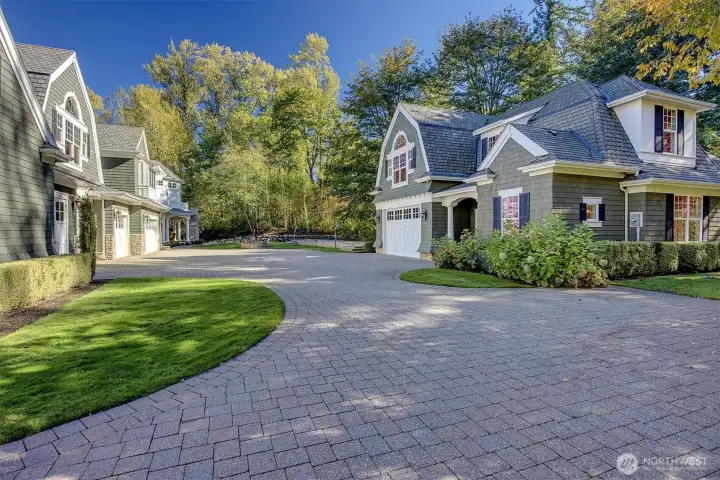 Note the separation between the two buildings.  Garages in both homes
