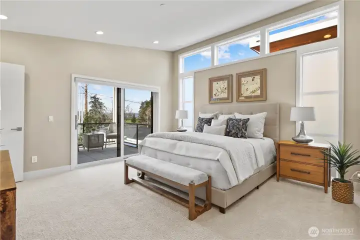 Primary suite with private deck and 5-piece bath.