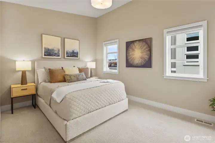 Third bedroom with custom closet organizer.