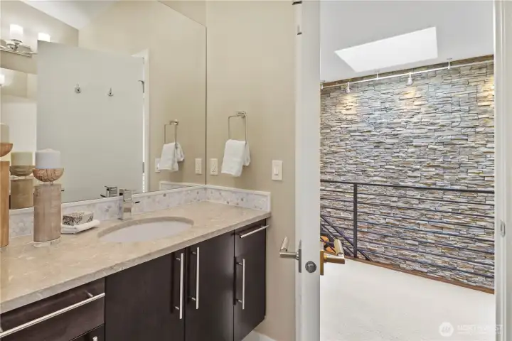 Main bath with dual vanities.
