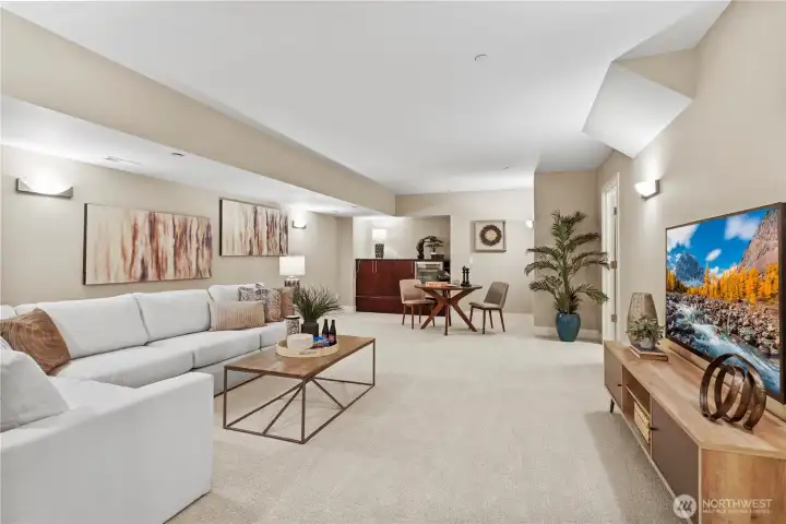 Spacious bonus/family room with built-in beverage refrigerator.