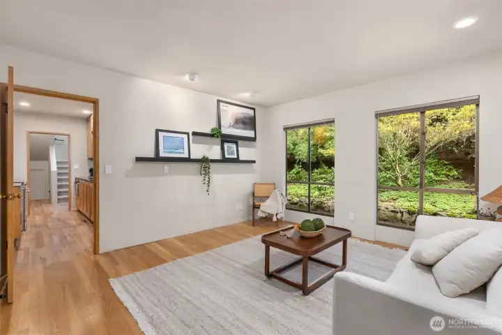 A flexible family room allows for a variety of uses, from cozy movie nights to a home office or play space.