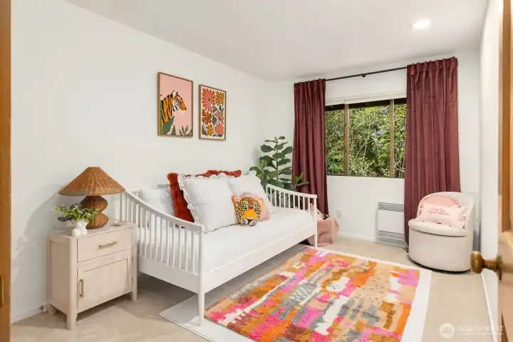 The second upstairs bedroom feels just shy of being on the wild side.