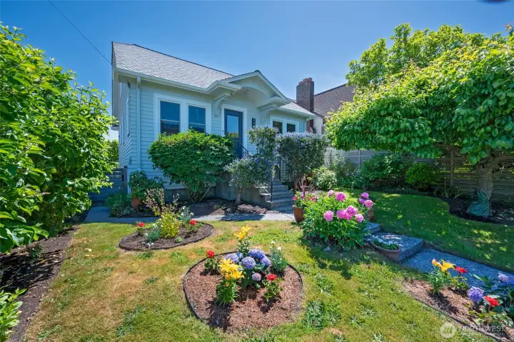Gates, rain barrels, Italian prune plum tree, and raised garden beds are part of the charm. Gates, rain barrels, Italian prune plum tree, and raised garden beds are part of the charm.