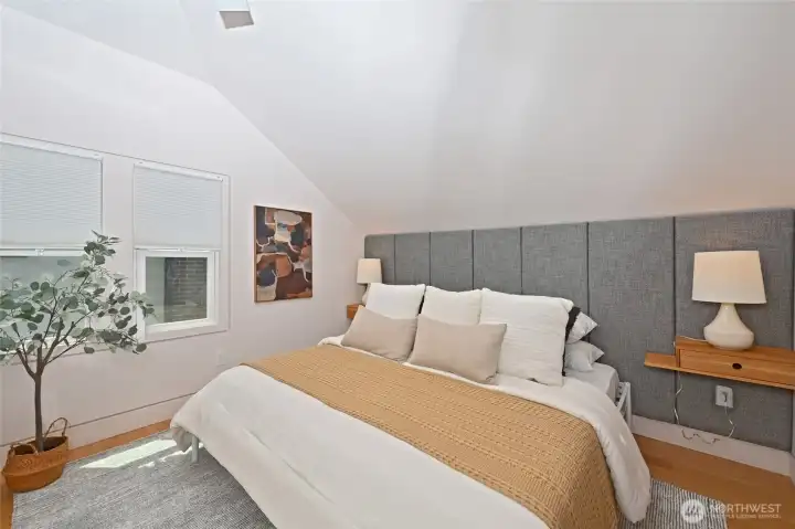 Built-in headboard and end tables for King size bed in primary suite. Built-in headboard and end tables for King size bed in primary suite.