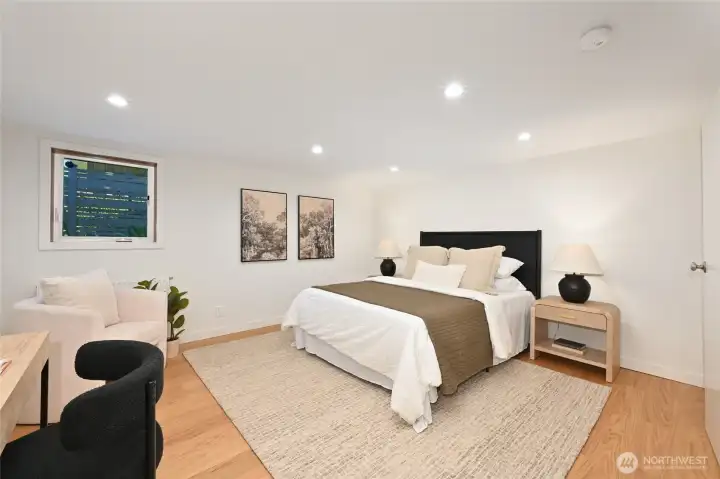 Large bedroom downstairs with walk-in closet. Large bedroom downstairs with walk-in closet.
