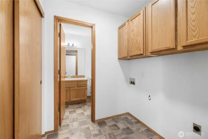 Laundry room off the guest bathroom. Laundry room off the guest bathroom.