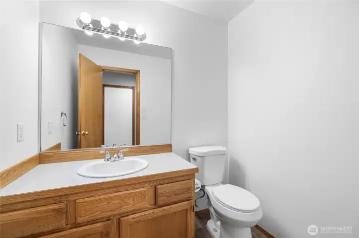 Guest bathroom with new vinyl flooring. Guest bathroom with new vinyl flooring.