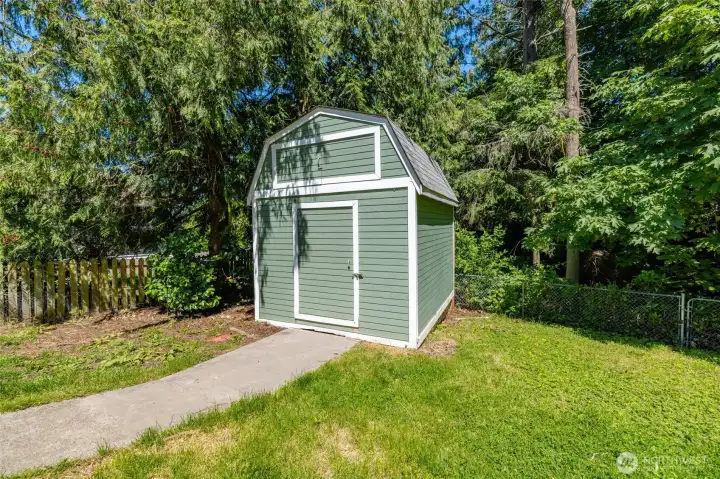 Nice-sized backyard featuring a convenient storage shed. Nice-sized backyard featuring a convenient storage shed.