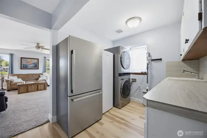 A an extra large utility room adjacent to the garage A an extra large utility room adjacent to the garage