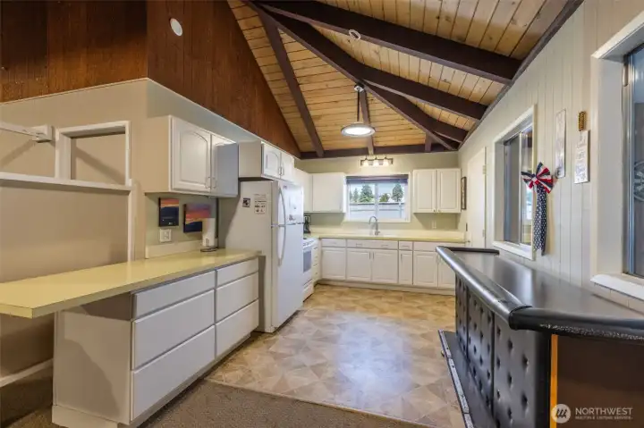 Community kitchen and bar space can be reserved for gatherings.
