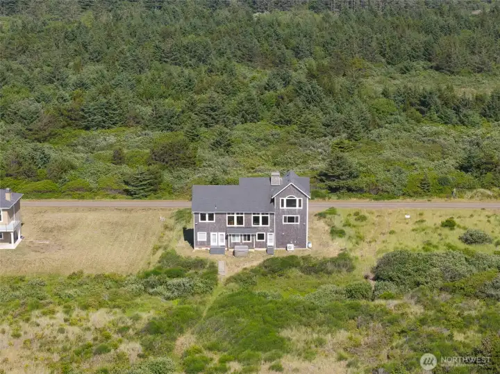 Aerial view of the rear of the home. Siding, etc. was replaced in 2023. Upgrades completed in 2026 as well. Aerial view of the rear of the home. Siding, etc. was replaced in 2023. Upgrades completed in 2026 as well.