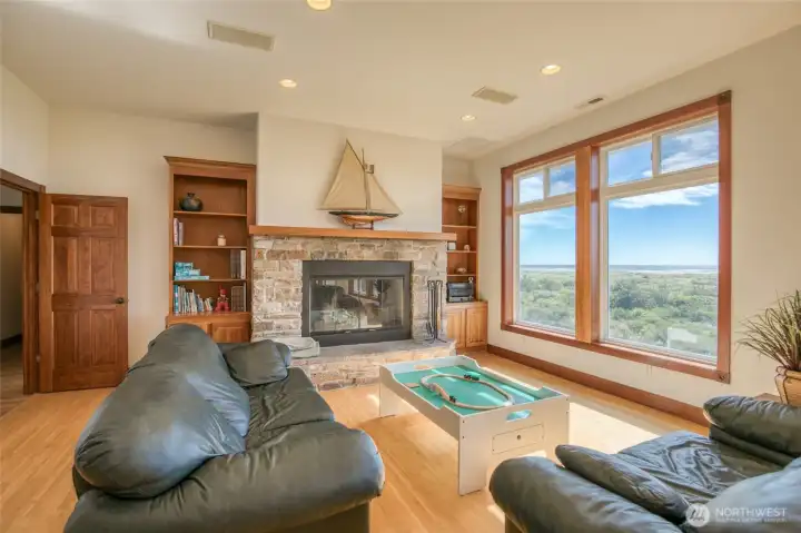 Living Room w/ a stylish wood-burning fireplace. Living Room w/ a stylish wood-burning fireplace.