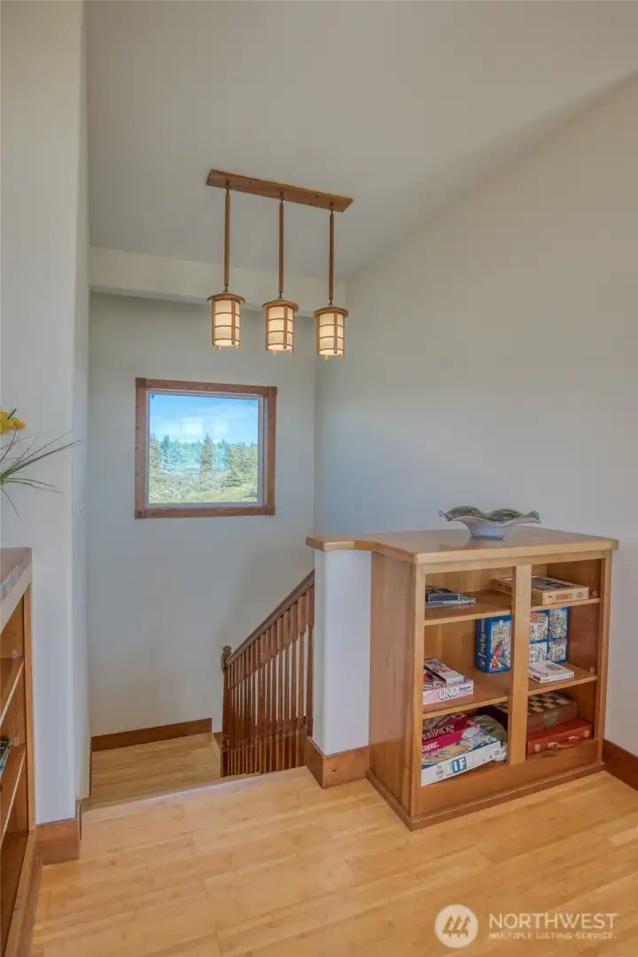Beautiful bamboo-flooring staircase leads to the 2nd-level. Beautiful bamboo-flooring staircase leads to the 2nd-level.