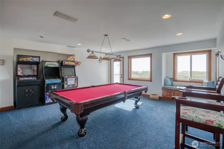 Large Rec/Game Room w/ pool table and arcade games included. Large Rec/Game Room w/ pool table and arcade games included.