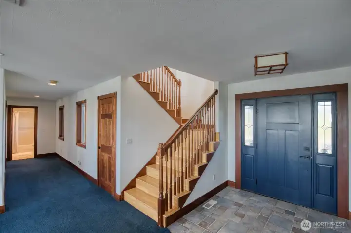 Entry and beautiful staircase with bamboo wood flooring. Hallway leads to the 1st-level bedrooms and bathroom. Entry and beautiful staircase with bamboo wood flooring. Hallway leads to the 1st-level bedrooms and bathroom.