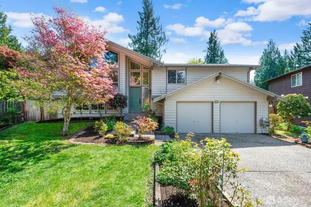Welcome to the May's Pond neighborhood.  The location of this home feels remarkably private with lush plantings surrounding.