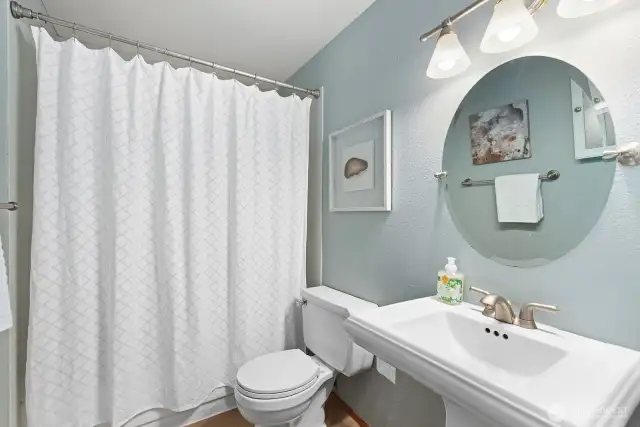 The full bathroom on the main has fresh paint, a new fan and a pedestal sink. Medicine cabinet (not shown)