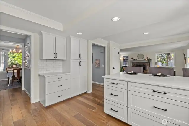Breezeway to formal dining room - additional pantry space located on the left.