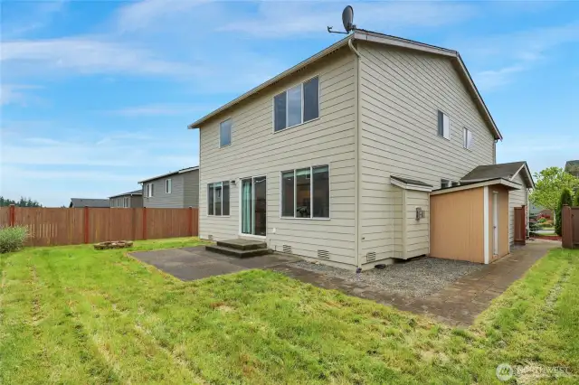 Fully fenced yard with a shed for lawn stuff, games, toys!