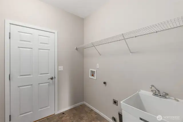 Laundry room with sink