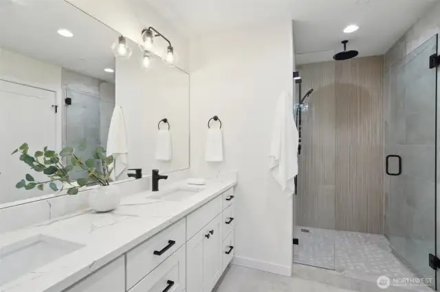 Photos of staged unit, 20313A. Walk-in shower with rain can showerhead and glass enclosure