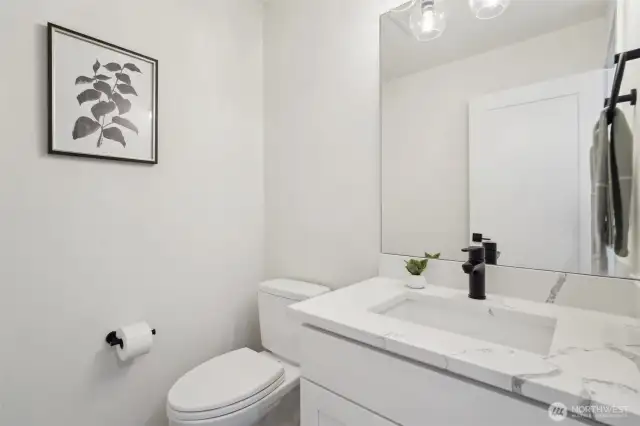 Photos of staged unit, 20313A. Level 2 half bath